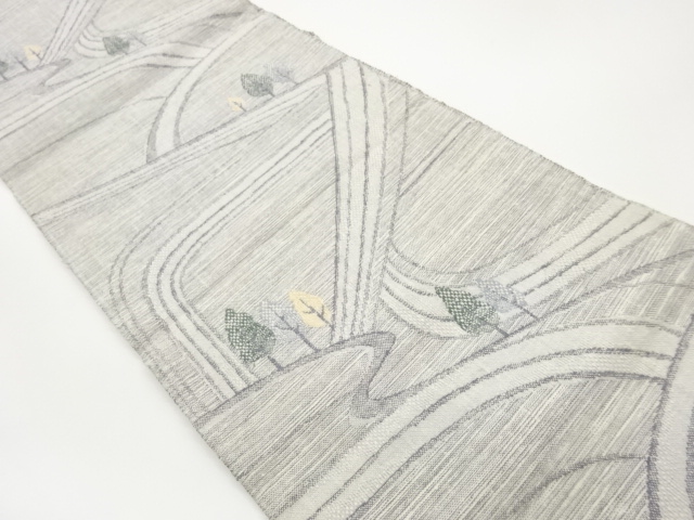 手織り真綿紬曲線に木々模様織出し名古屋帯